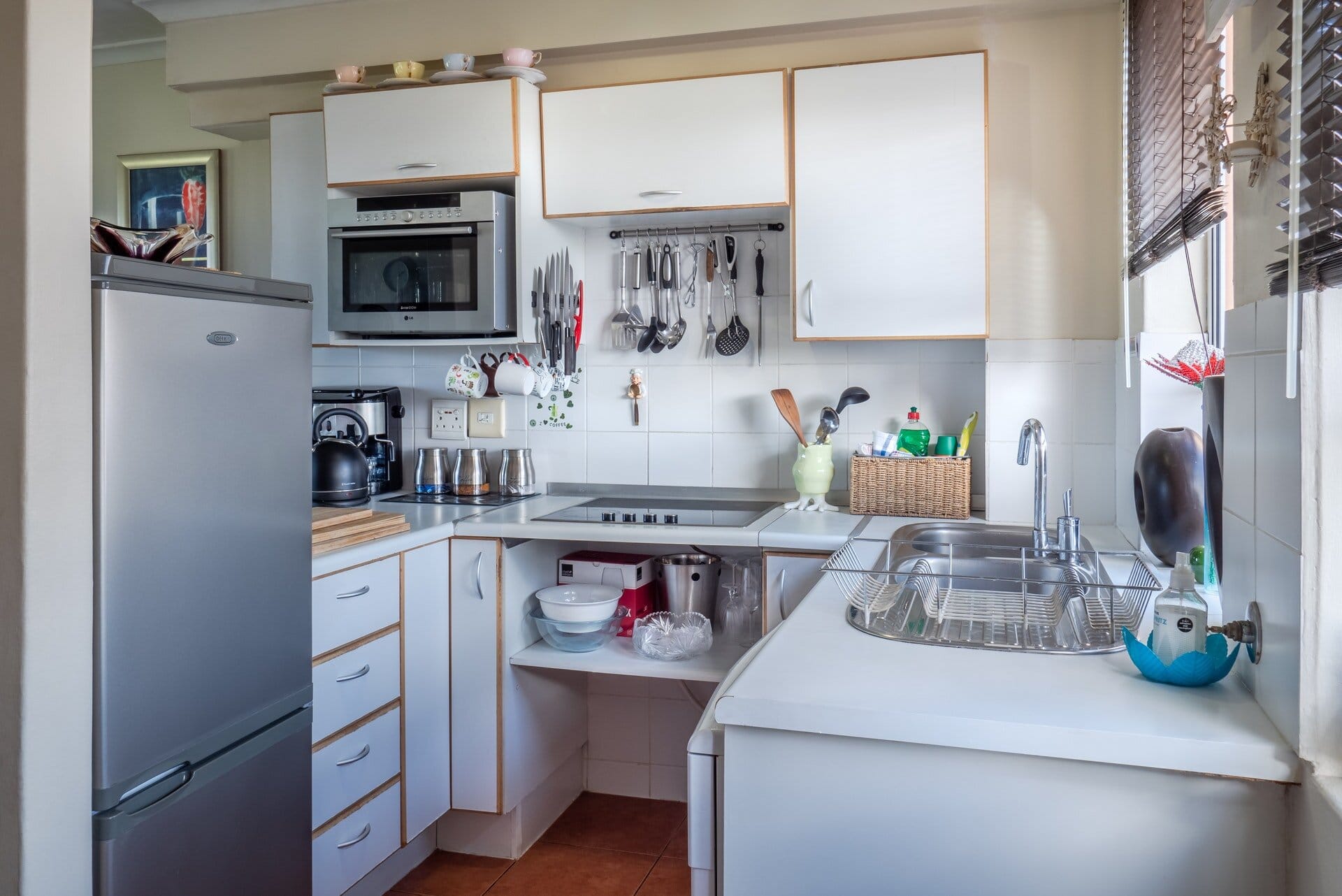 Space Saving Ideas for Small Kitchens 1white wooden kitchen cabinet 1599791June2020