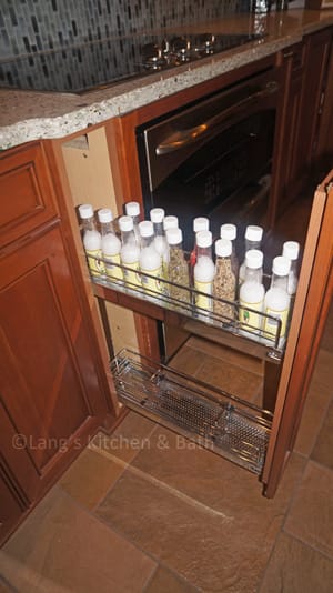 6 Kitchen Design Accessories to Get Organized for the Holidays OilandSpicePullOutKessenbohmer web