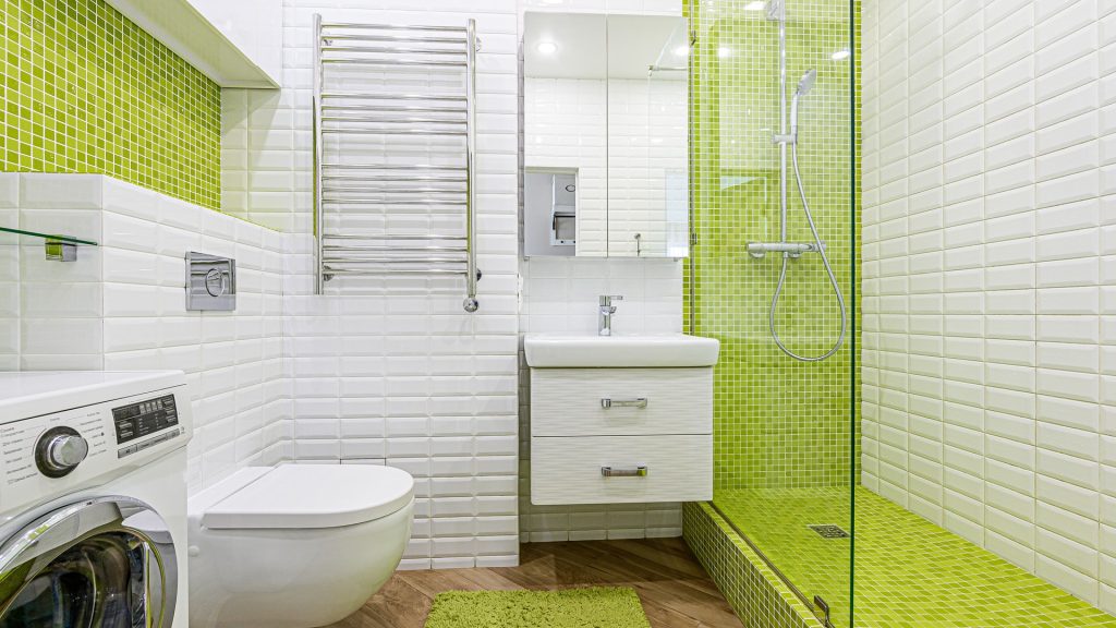 Bright modern primary bathroom with white subway tile, walk-in shower, and a freshly updated vanity — a pre-listing bath refresh in a Bucks County home