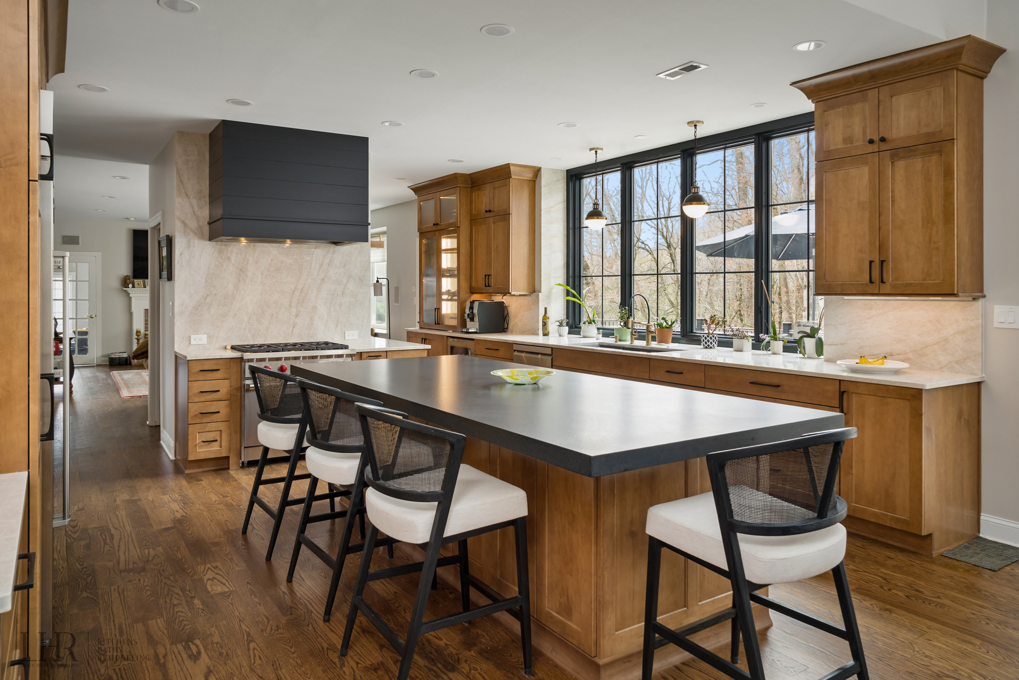 Custom wood kitchen cabinetry with an island in a Bucks County kitchen remodel by Lang's Kitchen & Bath