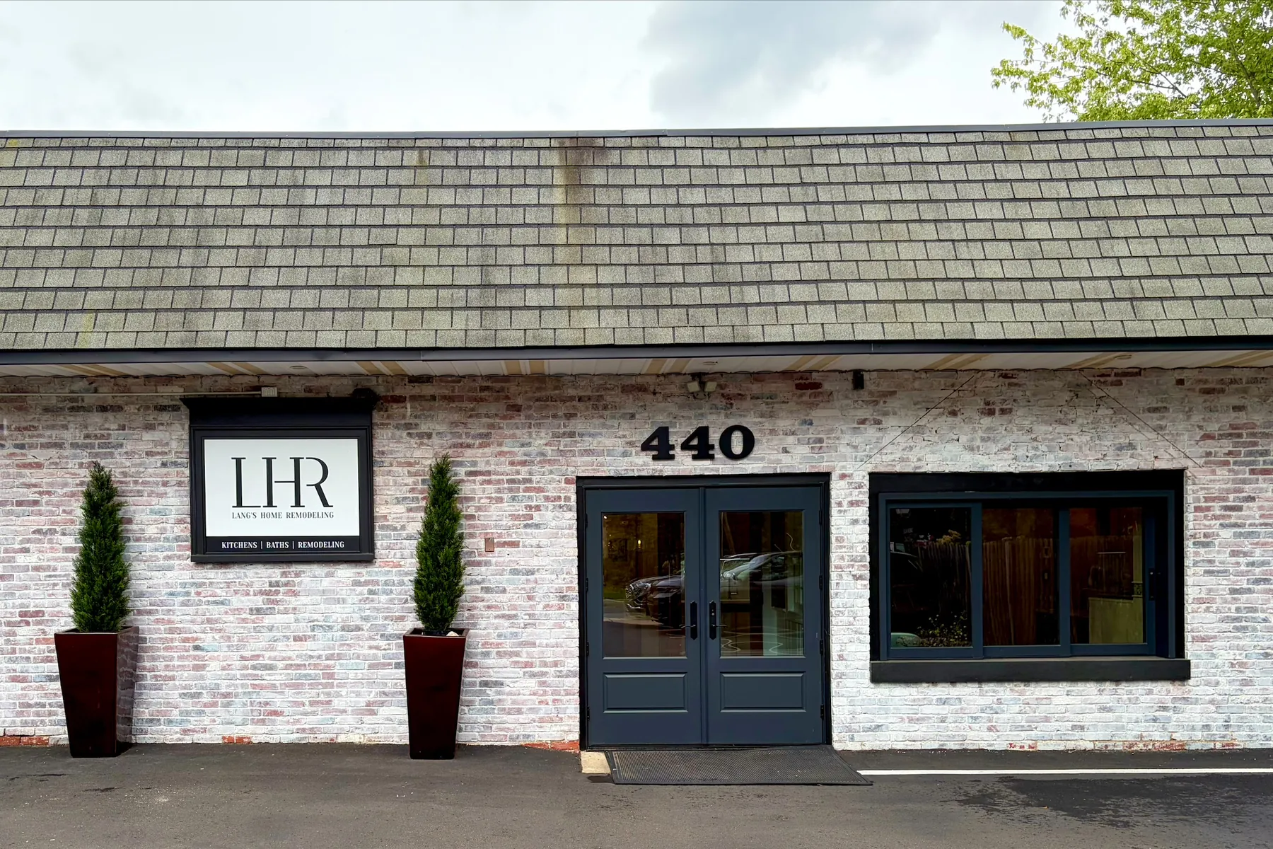 Lang’s Home Remodeling showroom at 440 East Centre Avenue in Newtown, PA, with the new LHR sign